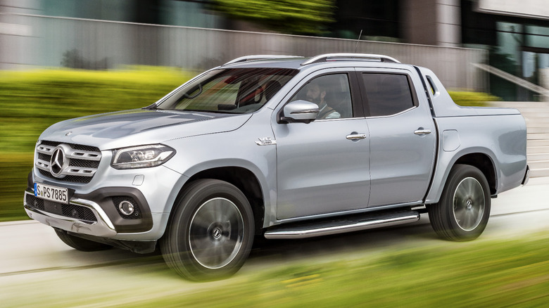 Silver Mercedes-Benz X-Class driving