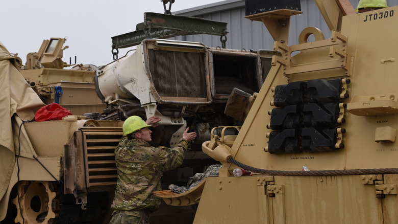 Maintenance of Abrams engine.