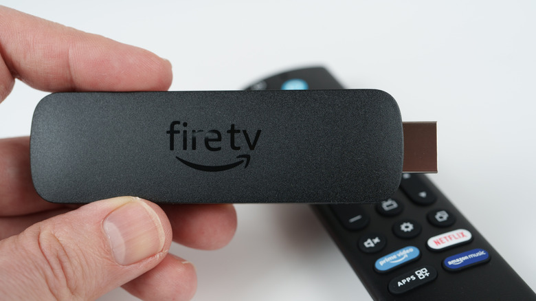 Holding a Fire TV Stick