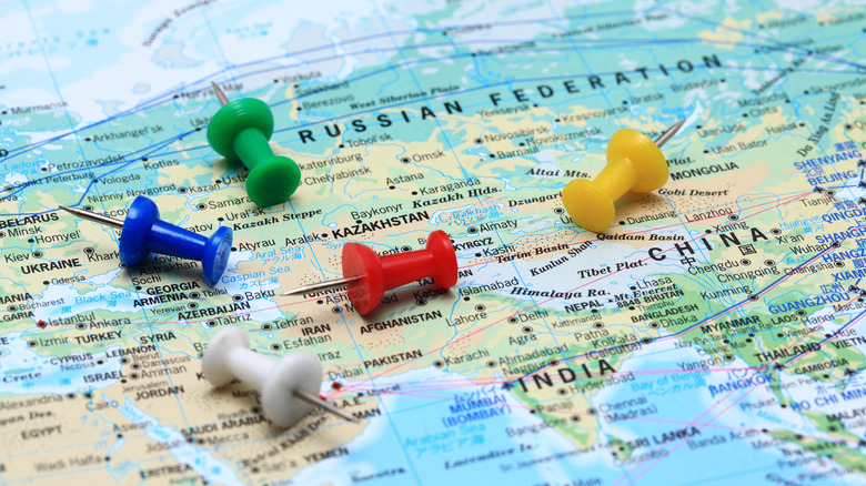 Map of Eurasia with pushpins