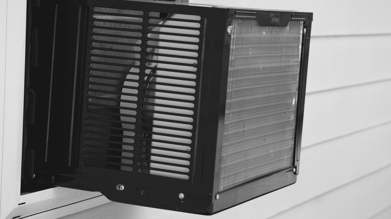 window AC unit outside of a house