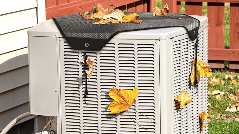 Fallen leaves resting on top of an HVAC unite