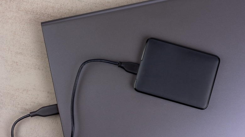 External SSD plugged into a laptop