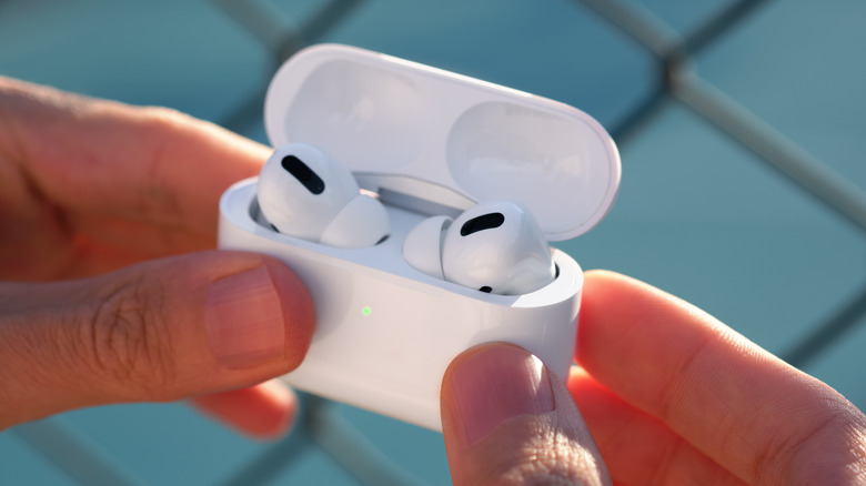 AirPods Pro in hand