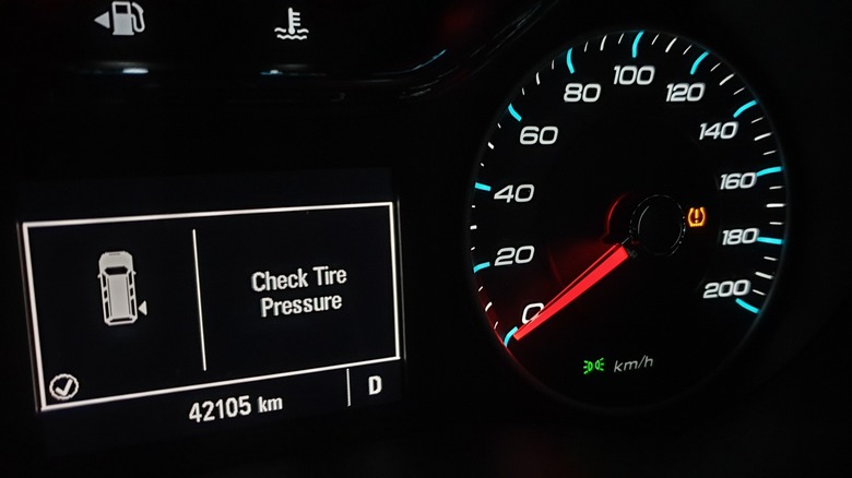 vehicle dashboard with tire pressure light