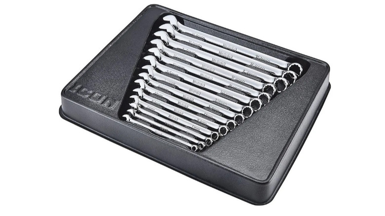Icon wrench set inside a black case on a white background