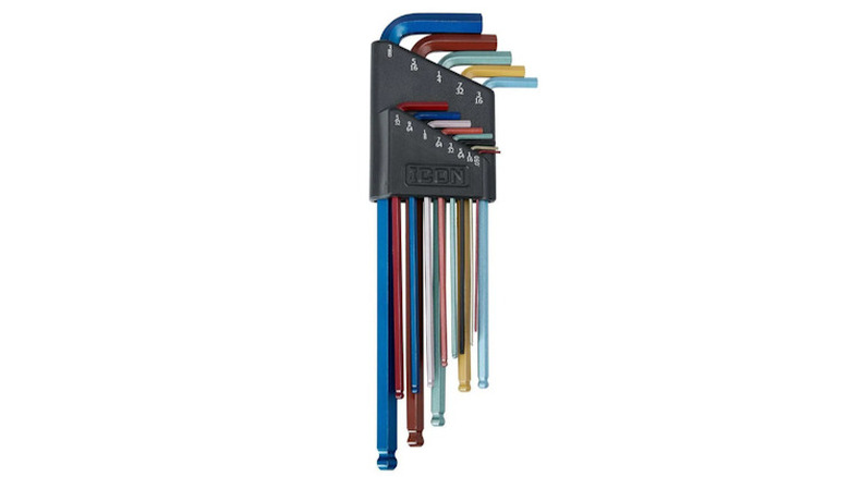 Colored hex keys in their holster on a white background