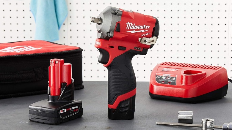 Milwaukee 2554-22 M12 Fuel Stubby 3/8" Impact Wrench Kit on a work bench
