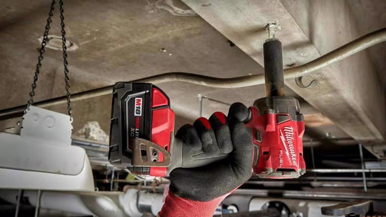 Milwaukee 2854-20 M18 Fuel 3/8 Inch Compact Impact Wrench in action