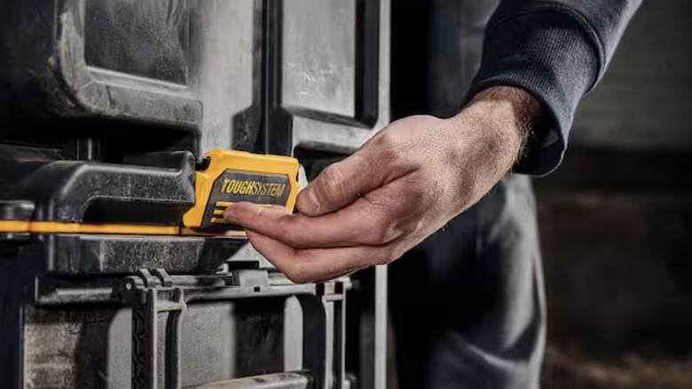 Person using Dewalt Rolling Tool Box