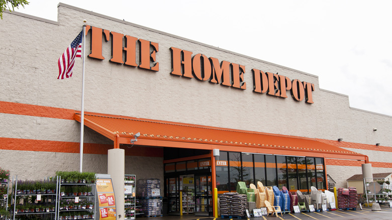 Home Depot storefront with flag waving in the breeze
