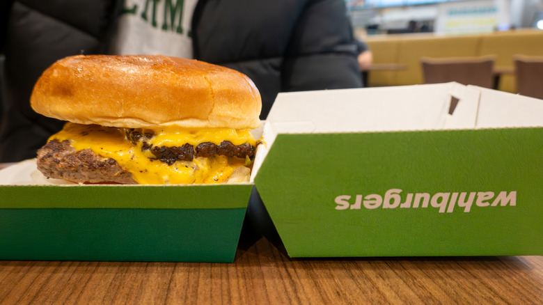 a wahlburger hamburger on a table