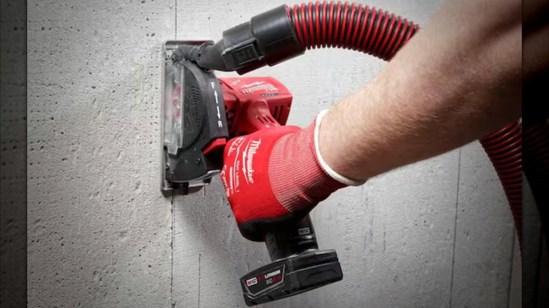 Milwaukee M12 Fuel 3-inch Cut-Off Saw in use