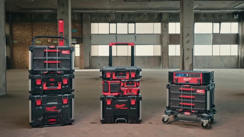 Various Milwaukee Packout options stacked in a warehouse