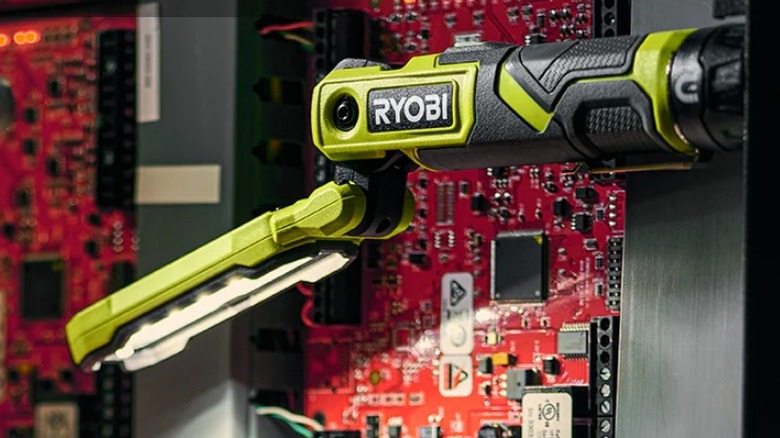 USB Lithium LED Inspection Light attached to metal over circuit board