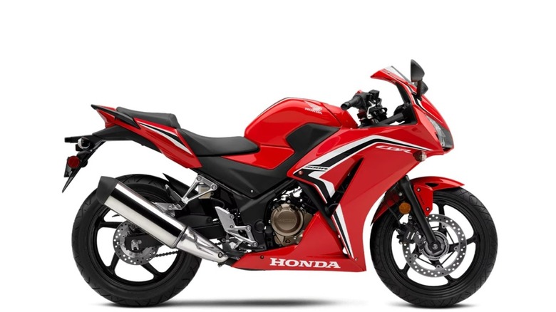 The 2022 Honda CBR300R isolated on a white background.