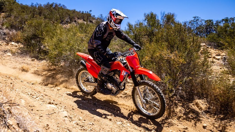 Person riding CRF250F on trail