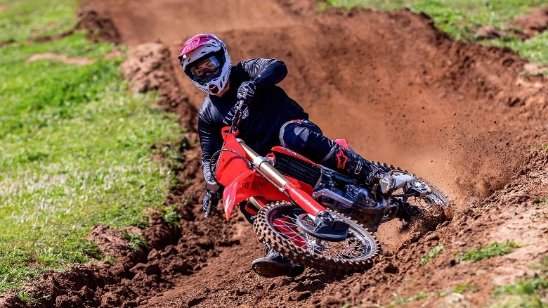 Person cornering on CRF250R