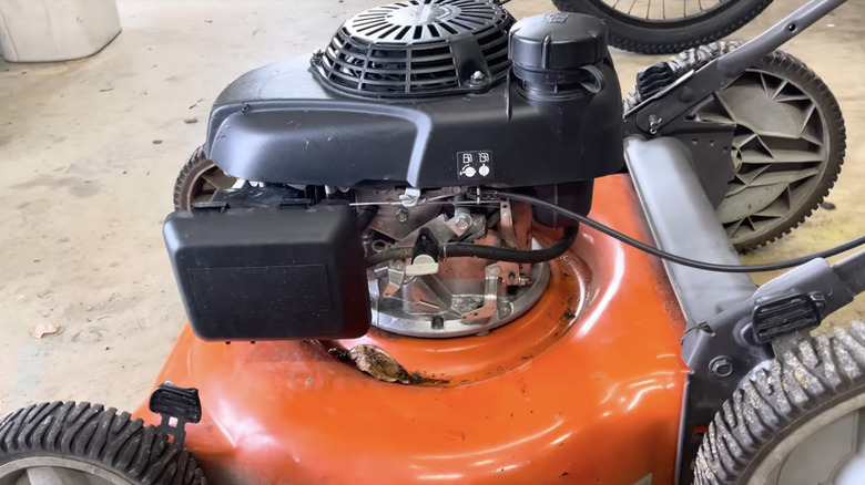 A close-up shot of the carburetor on a Honda GCV 160