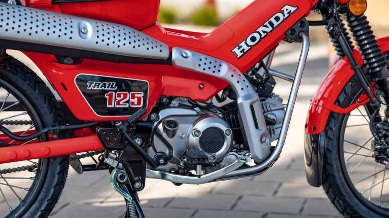 Close-up of a Honda Trail125 engine