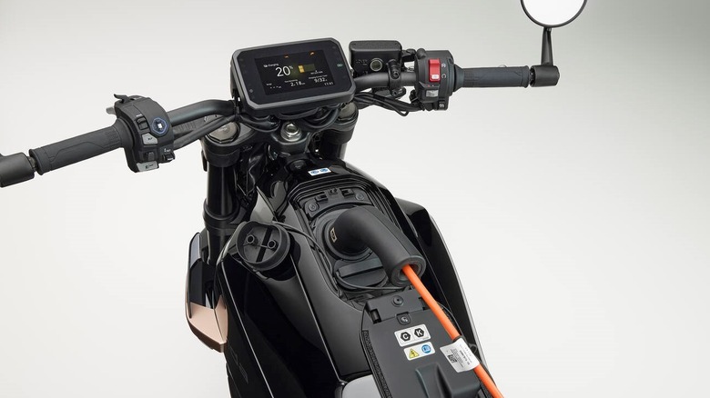 Honda WN7 motorcycle plugged in charging
