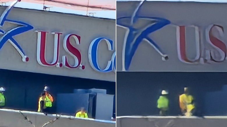 Men on a building