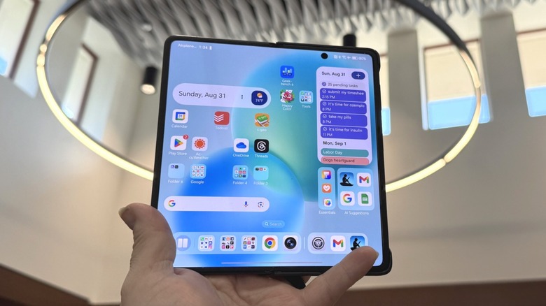Honor Magic V5 on a book