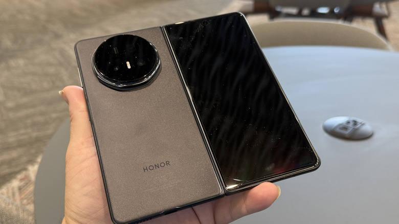 Honor Magic V5 in a man's hand
