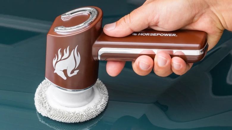 A person using a Horsepower Scrubber.