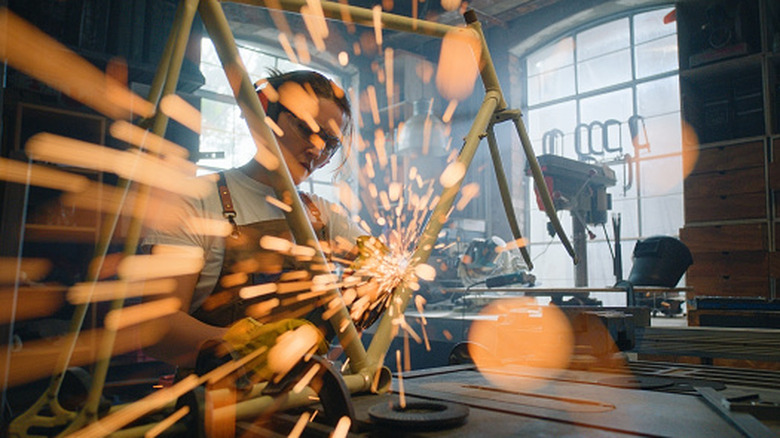 Sparks flying from a tool in use.
