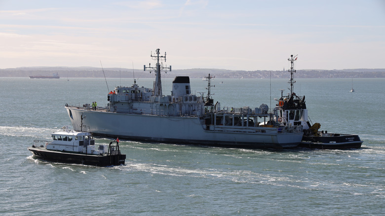 The ex-Royal Navy mine countermeasures vessel ATHERSTONE leaves harbour under tow