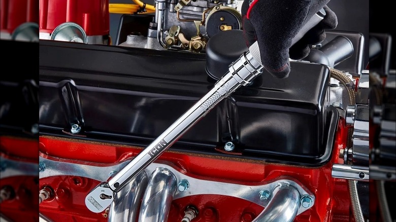Torquing exhaust manifold bolts with an Icon torque wrench from Harbor Freight.