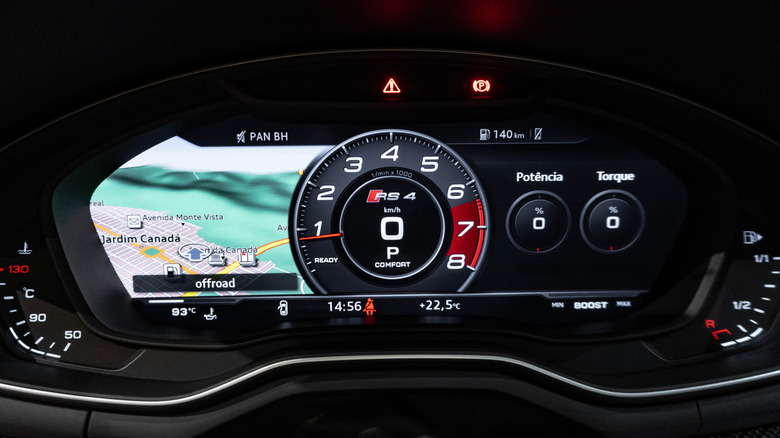 A close-up of an Audi RS4 Virtual Cockpit digital gauge cluster.