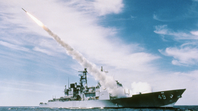 Naval vessel firing missile