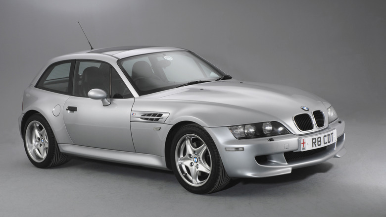 Front 3/4 view of silver BMW Z3 M in grey studio.