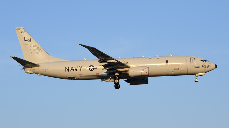Profile view of a P-8 Poseidon flying