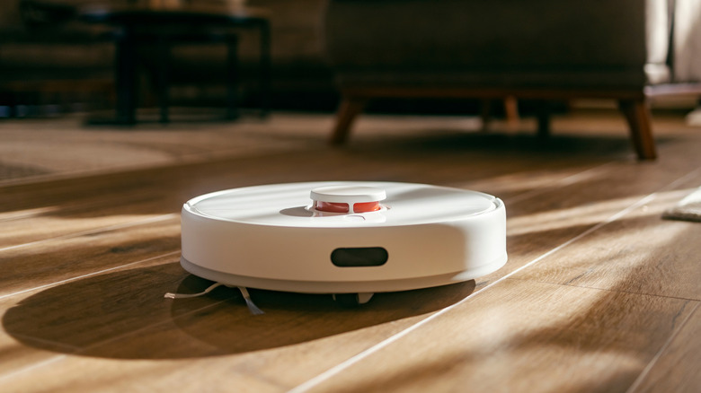 Robot vacuum cleaning a floor