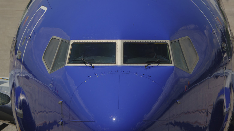 Front view of aircraft's windshield and nose.