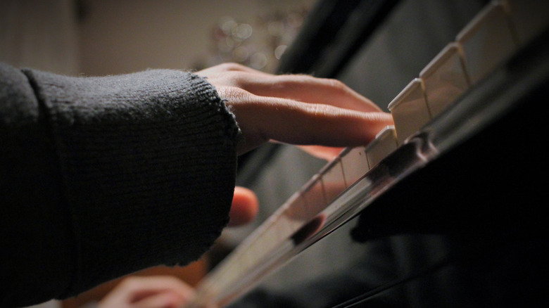 Grand Yamaha piano being played
