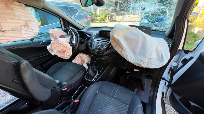 Airbags deployed after a Ford was involved in a high-impact crash.