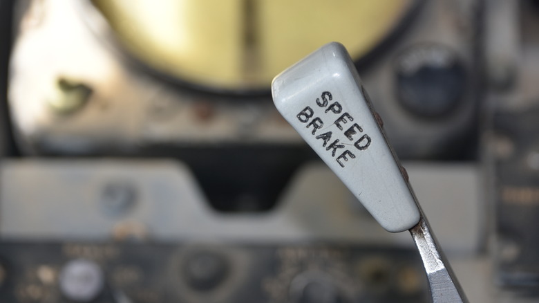 Speed brake handle inside an airplane cockpit