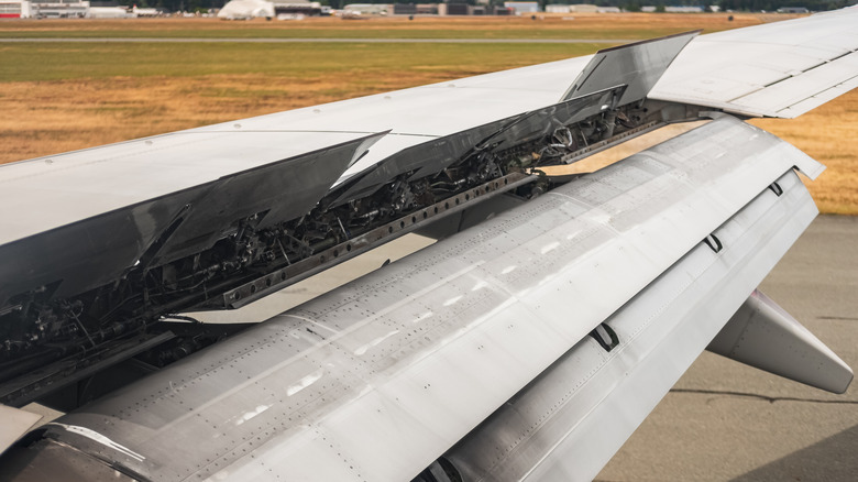 Airplane wing with the spoiler open