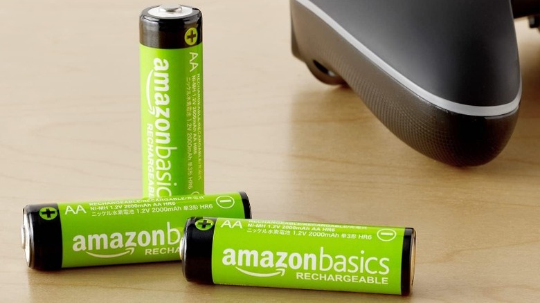 Amazon Basics AA bateries on table next to Xbox controller