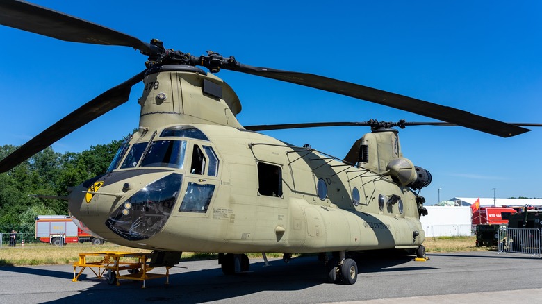 A grounded Boeing CH-47 Chinook on a sunny day