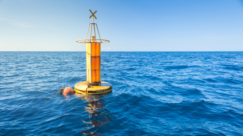 A yellow buoy without land in sight