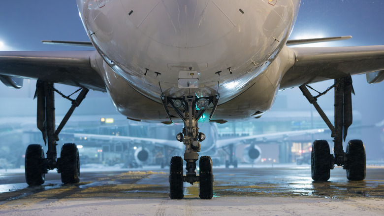 Close view of airplane landing gear.