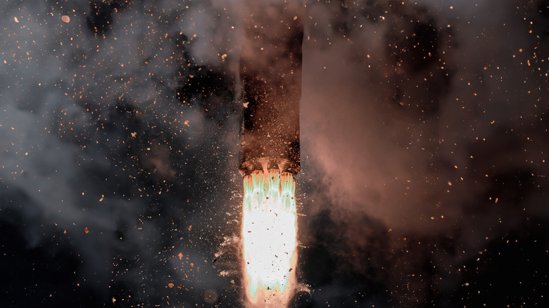 gases and flames leaving the rocket