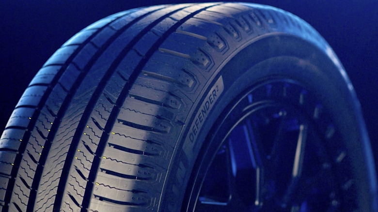 Picture showing Defender logo on a Michelin tire