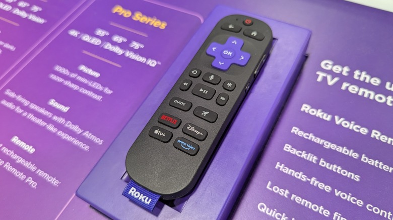 A Roku remote showcases its Netflix, HBO, Prime Video, and ApplyTV+ buttons.