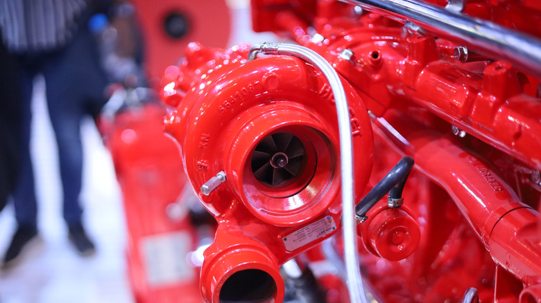 Close-up of Holset turbocharger mounted to Cummins engine on display